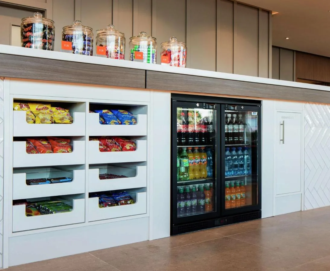 Refrigerator stocked with snacks and drinks